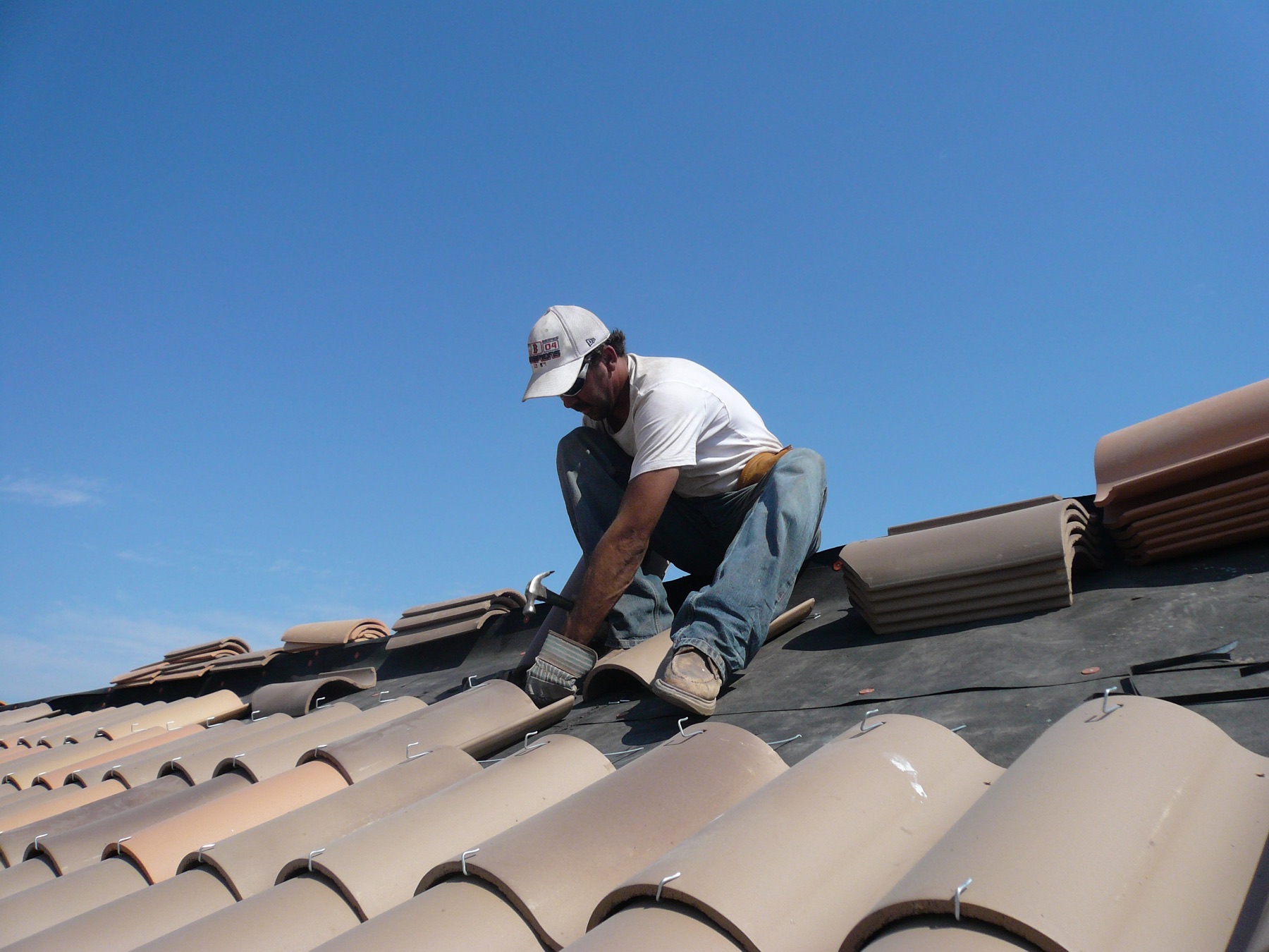 Roofing work on a tile roof